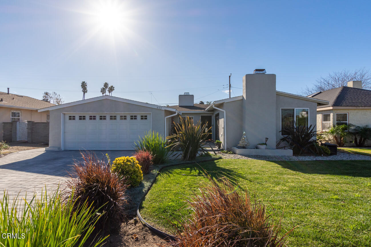 612 West Roderick Avenue Oxnard, CA 93030 - Photo 2 of 26 a view of a house with a yard
