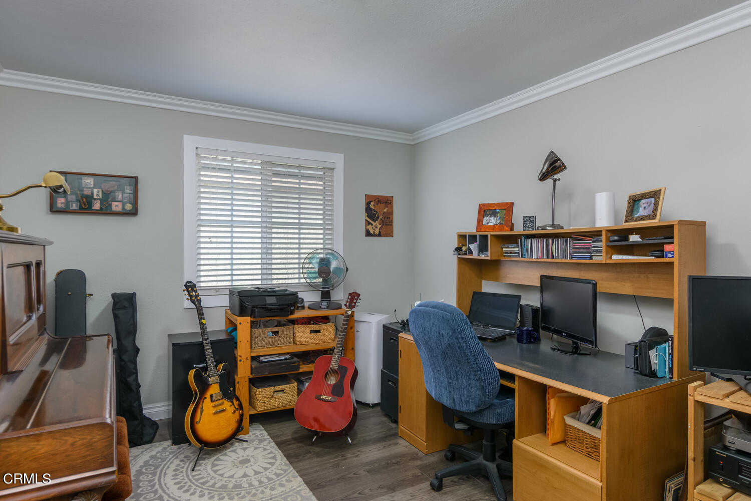 612 West Roderick Avenue Oxnard, CA 93030 - Photo 13 of 26 a view of a workspace with furniture and a window