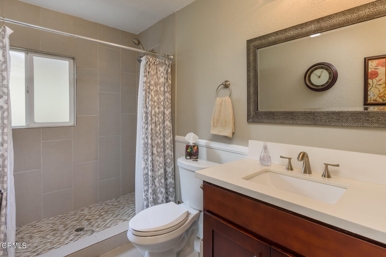 612 West Roderick Avenue Oxnard, CA 93030 - Photo 14 of 26 a bathroom with a sink a toilet and shower