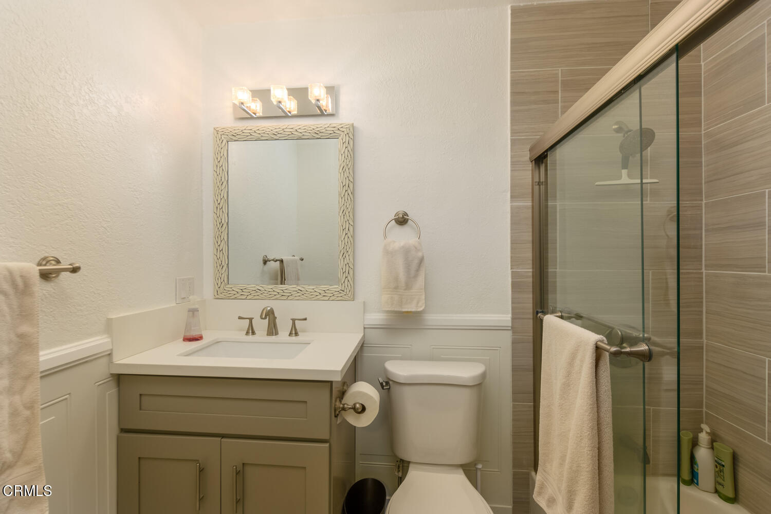 612 West Roderick Avenue Oxnard, CA 93030 - Photo 20 of 26 a bathroom with a toilet sink and mirror