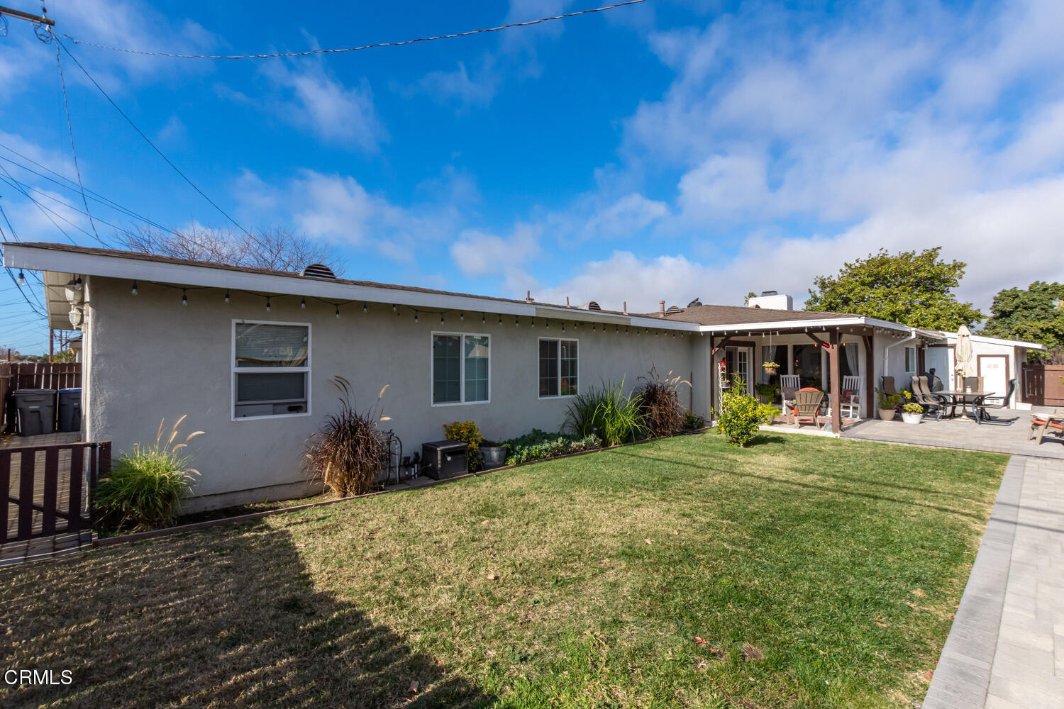 612 West Roderick Avenue Oxnard, CA 93030 - Photo 25 of 26 a front view of house with yard and outdoor seating