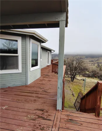 a view of a yard with a snow
