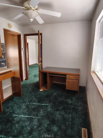 a room with stairs and a window