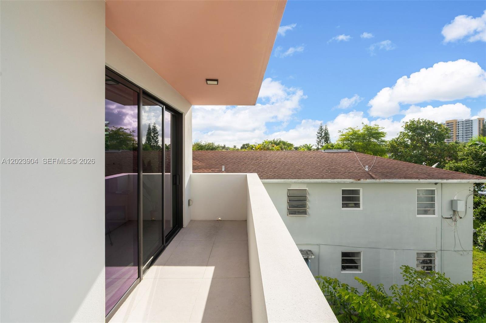 721 Southwest 11th Street, Unit G Miami, FL 33129 - Photo 28 of 40 a view of a house with a balcony