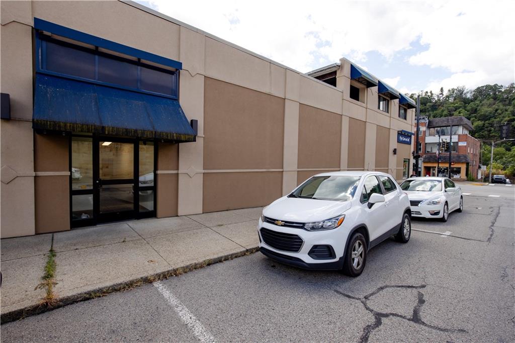 302 9th Street New Brighton, PA 15066 - Photo 3 of 16 a car parked in front of house