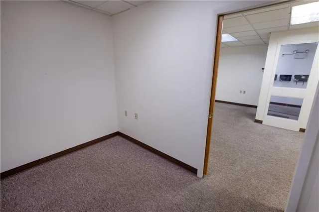 a view of a room with a hallway