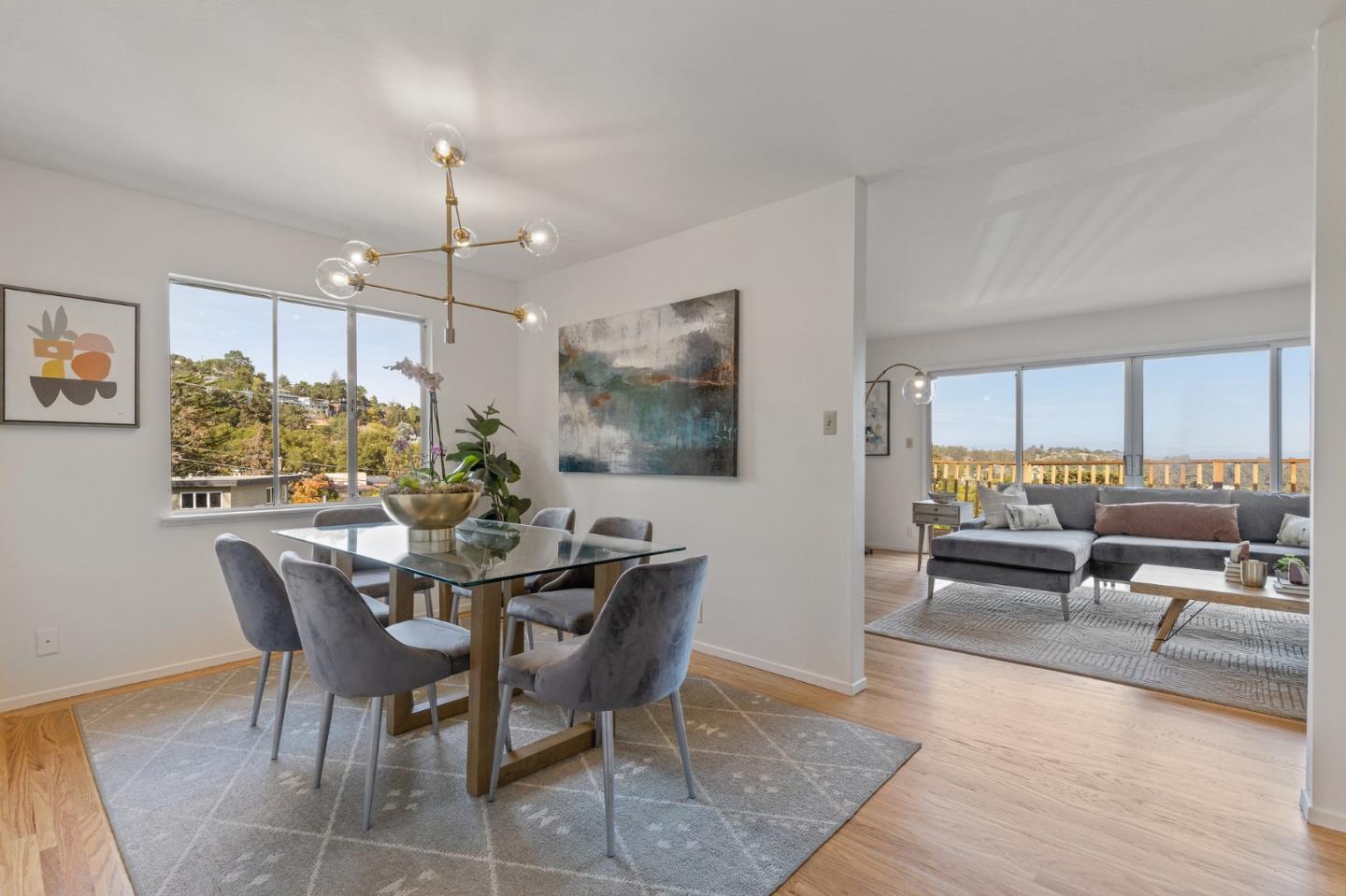 2203 Ewell Road Belmont, CA 94002 - Photo 14 of 50 a view of a dining room with furniture window and outside view