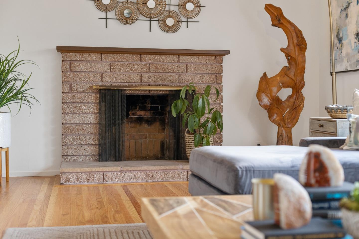 2203 Ewell Road Belmont, CA 94002 - Photo 20 of 50 a living room with furniture and a fireplace