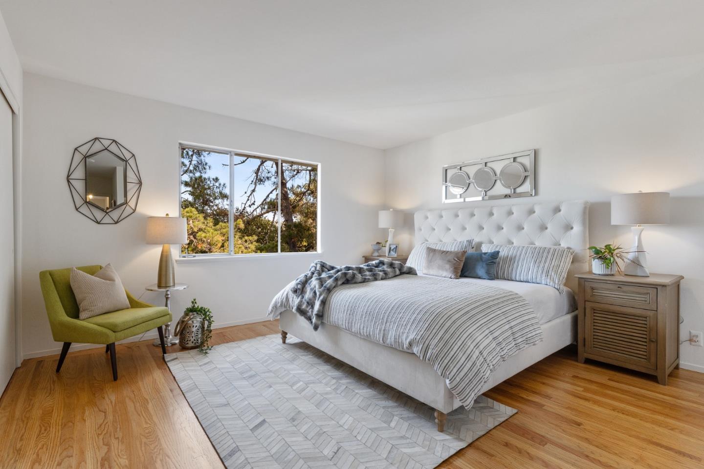 2203 Ewell Road Belmont, CA 94002 - Photo 22 of 50 a bedroom with a bed and window