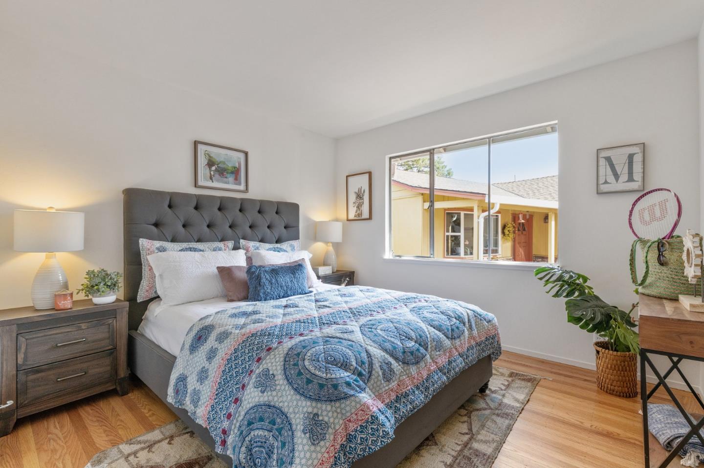 2203 Ewell Road Belmont, CA 94002 - Photo 27 of 50 a bedroom with a large bed and a window