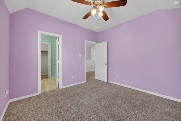 a bathroom with a sink toilet and vanity