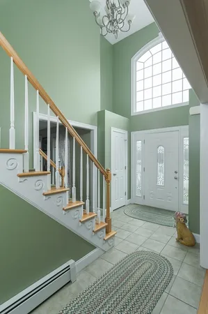 a view of entryway and hall with a window