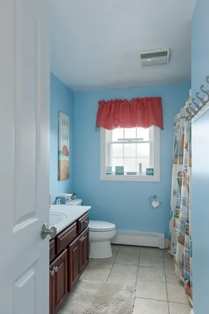 a view of bathroom with dual sinks
