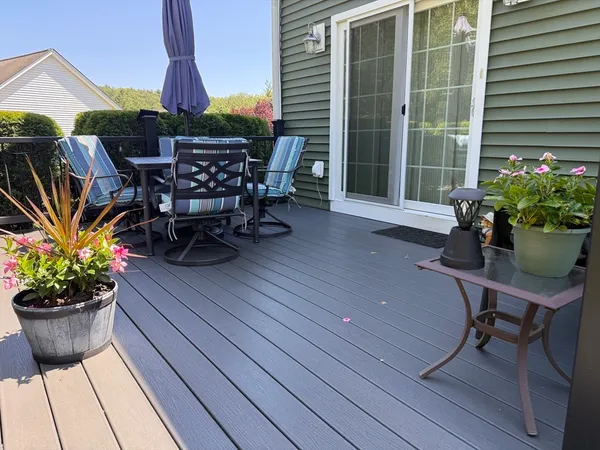 a view of a terrace with furniture