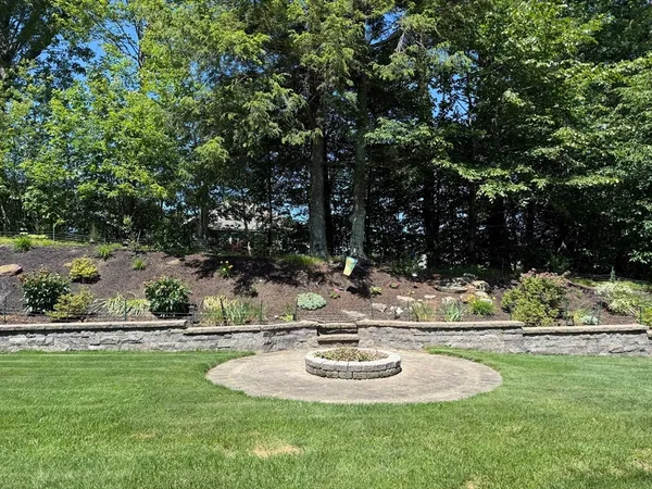 a view of a swimming pool with a yard