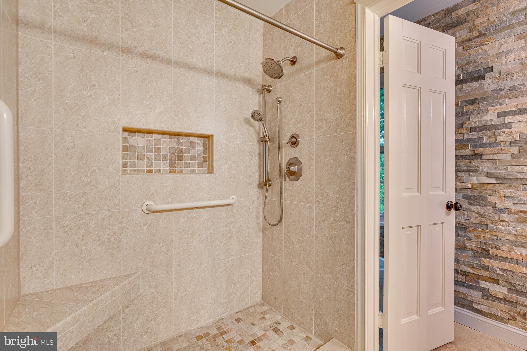 10233 Seven Locks Road Potomac, MD 20854 - Photo 18 of 33 Luxury Shower with Multiple Spray Heads and Bench