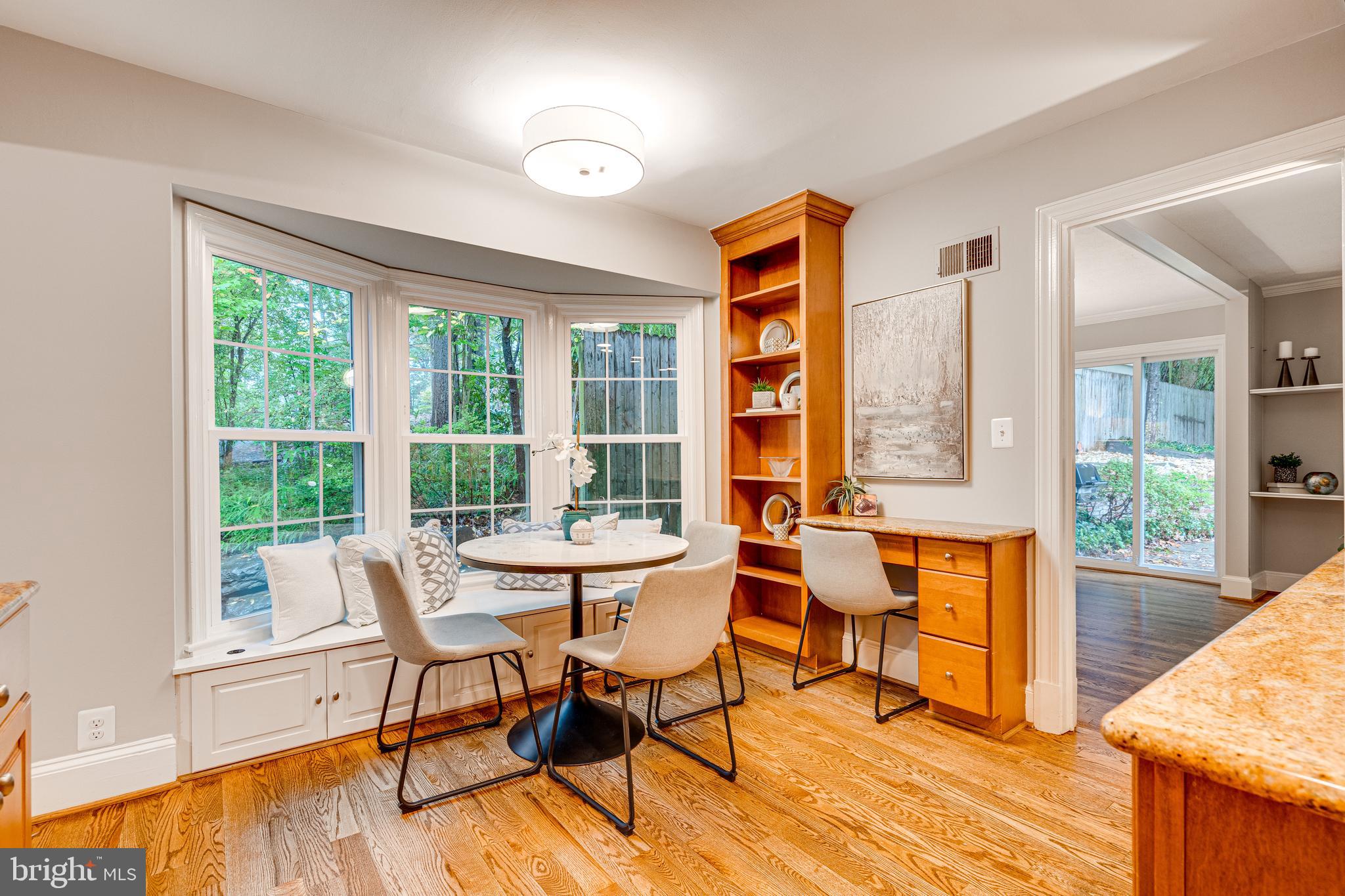 10233 Seven Locks Road Potomac, MD 20854 - Photo 9 of 33 Table Space Kitchen with Built-Ins