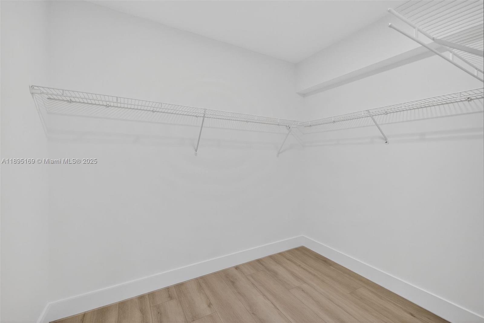 261 Deer Creek Boulevard, Unit 1205 Deerfield Beach, FL 33442 - Photo 20 of 38 a view of a room with shelf on the wall