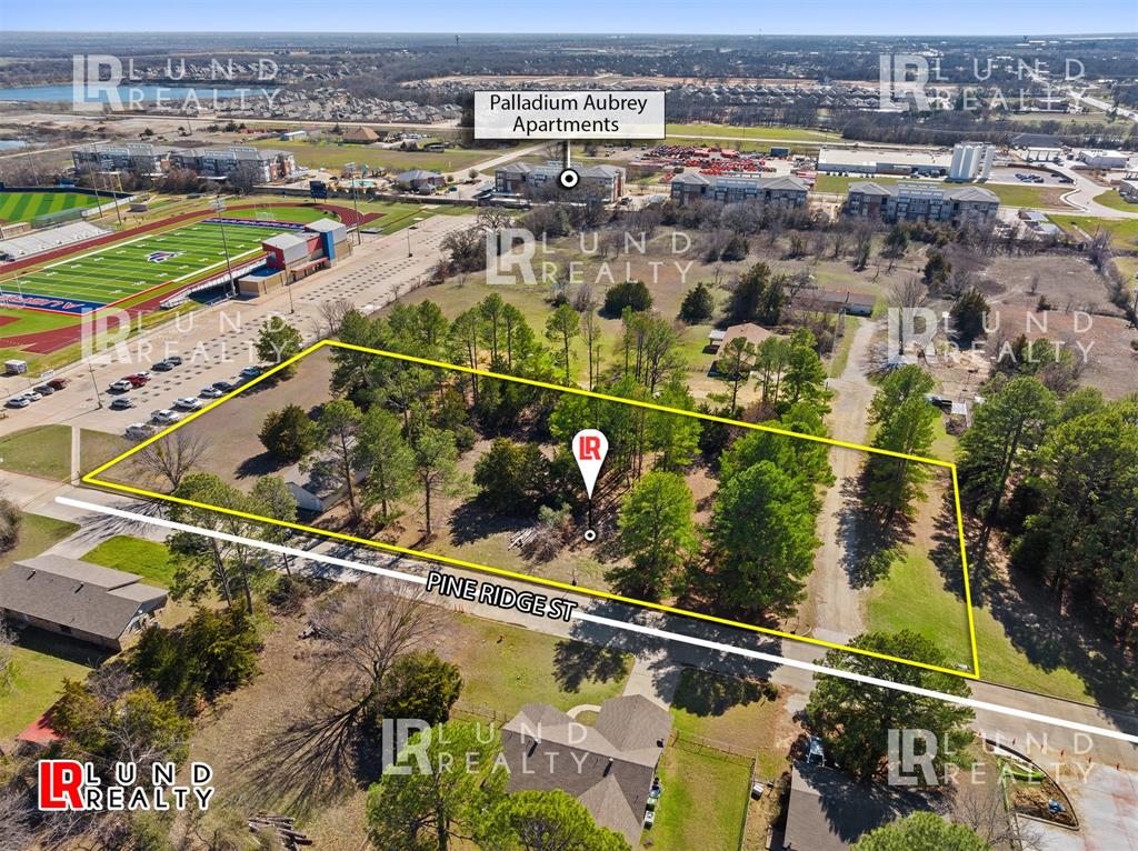 .652-ac Pine Ridge Street Aubrey, TX 76227 - Photo 10 of 14 an aerial view of swimming pool with a yard and seating space