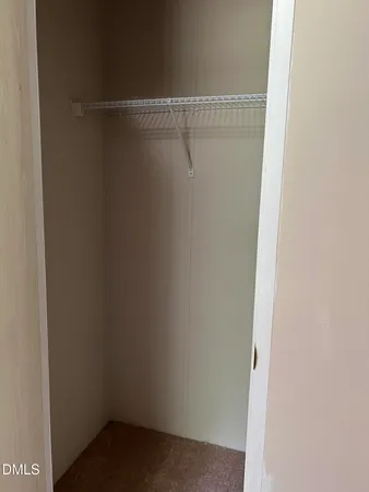 a view of small space with racks on the wall