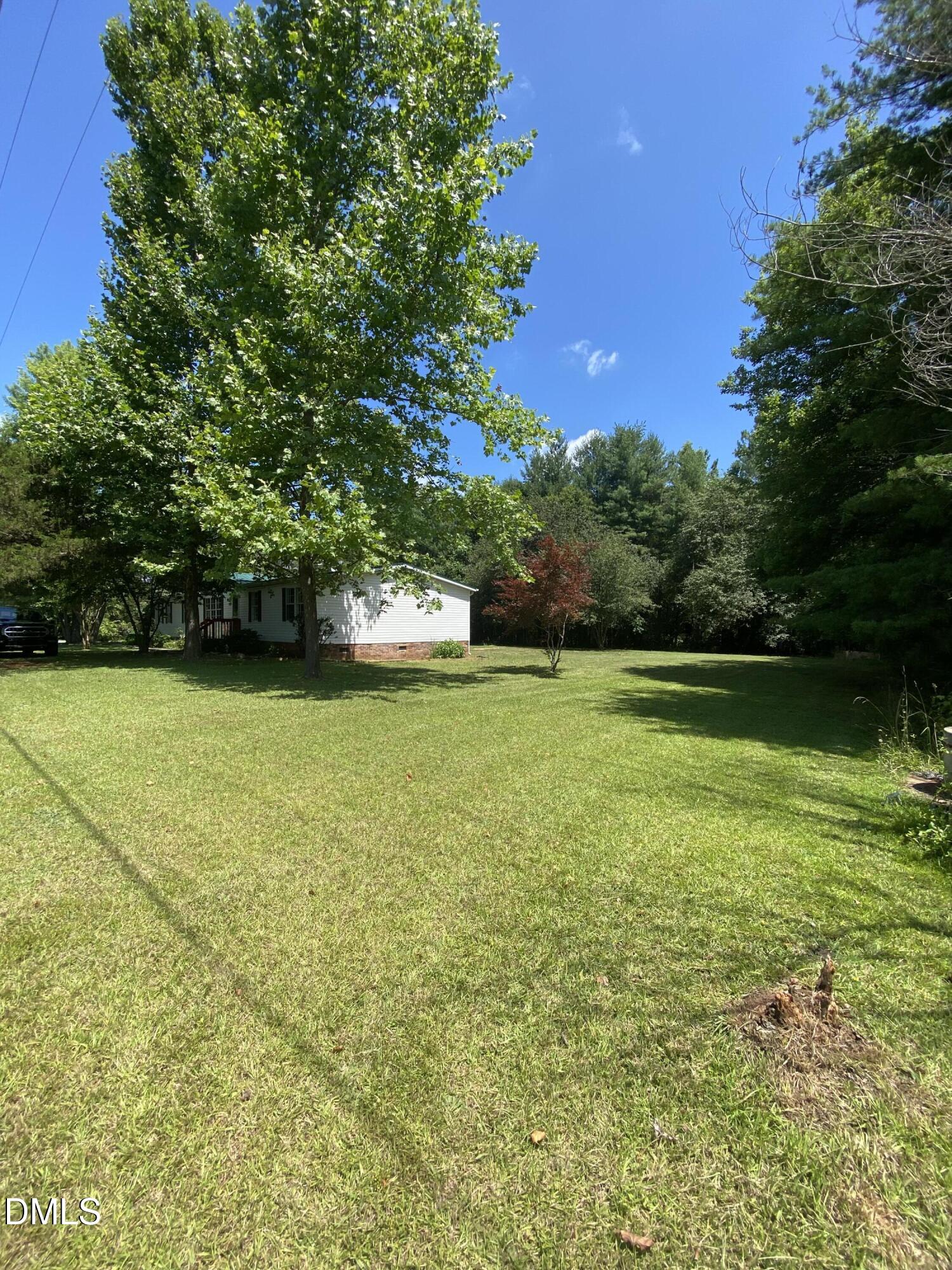 2735 Lucy Garrett Road Timberlake, NC 27583 - Photo 21 of 21 side yard
