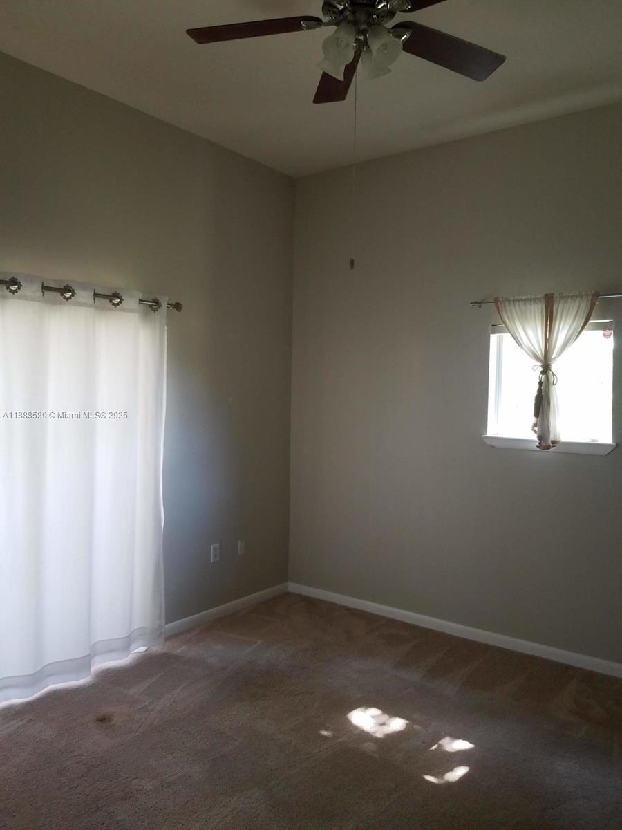 4863 Via Palm Lakes, Unit 806 West Palm Beach, FL 33417 - Photo 11 of 23 a view of empty room