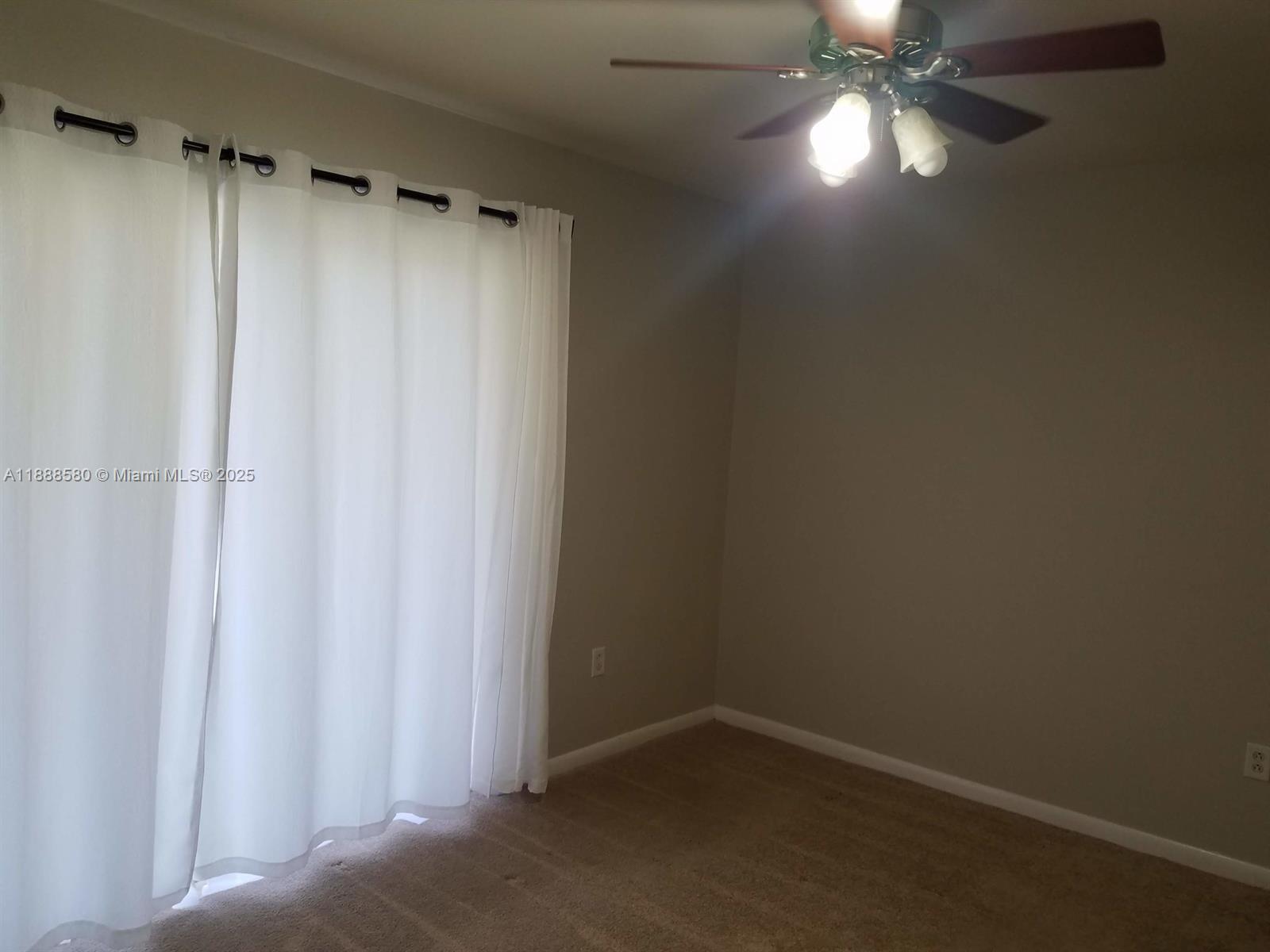 4863 Via Palm Lakes, Unit 806 West Palm Beach, FL 33417 - Photo 18 of 23 a view of an empty room