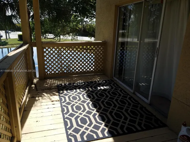a view of a wooden fence