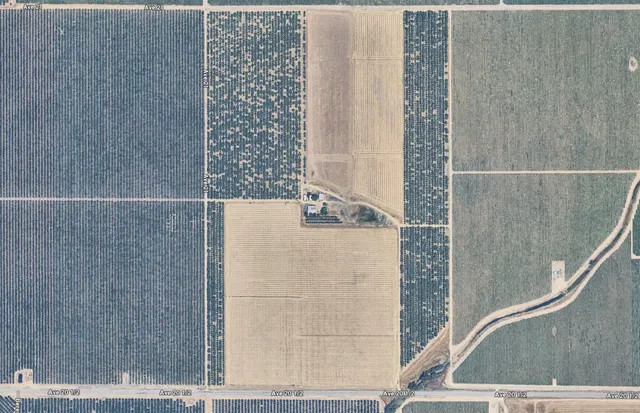 a utility room with dryer and shower
