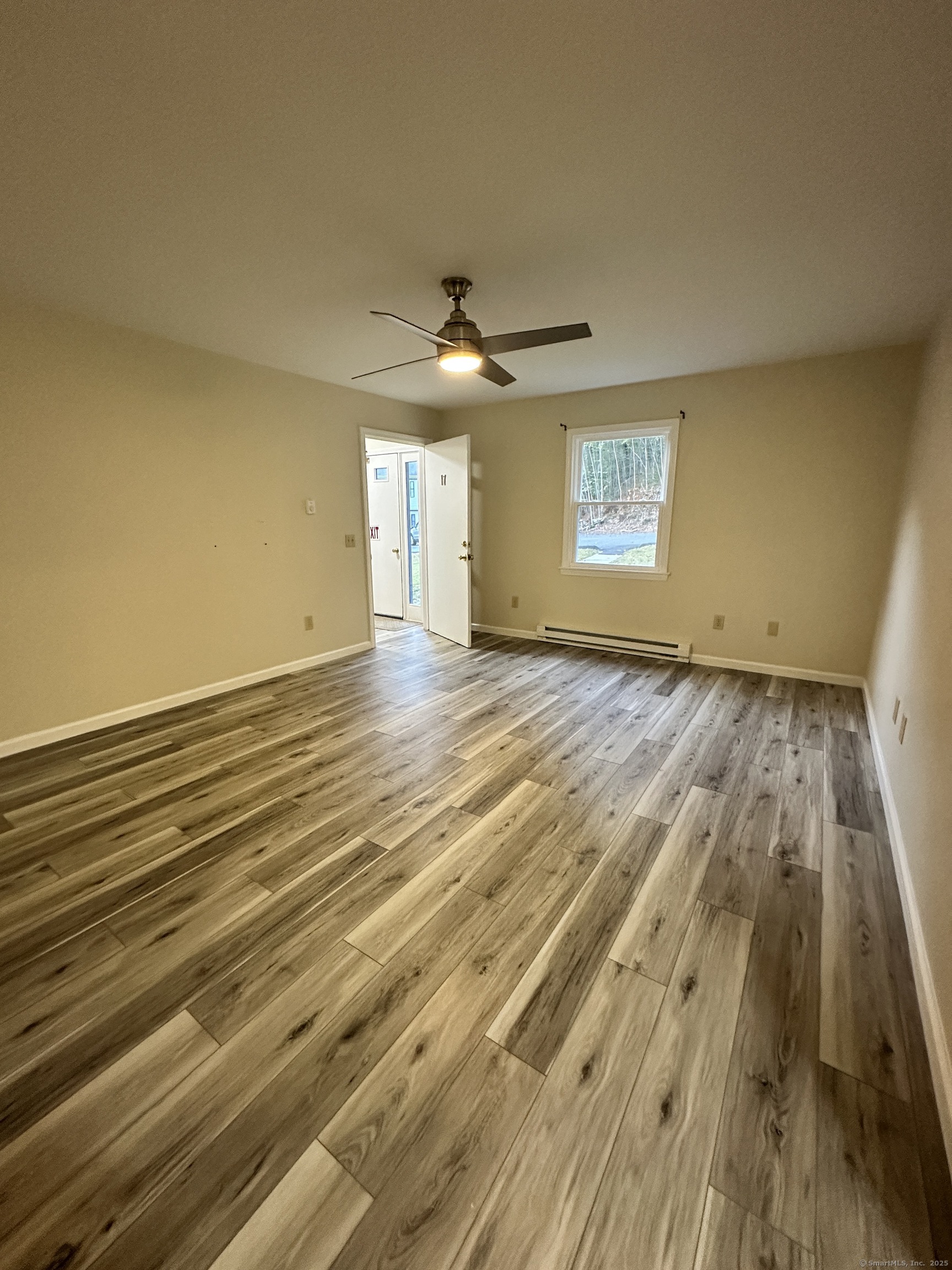 70 Pond Meadow Road Essex, CT 06442 - Photo 5 of 12 wooden floor in an empty room