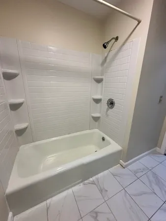 a bathroom with a bathtub