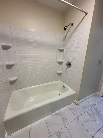a bathroom with a bathtub