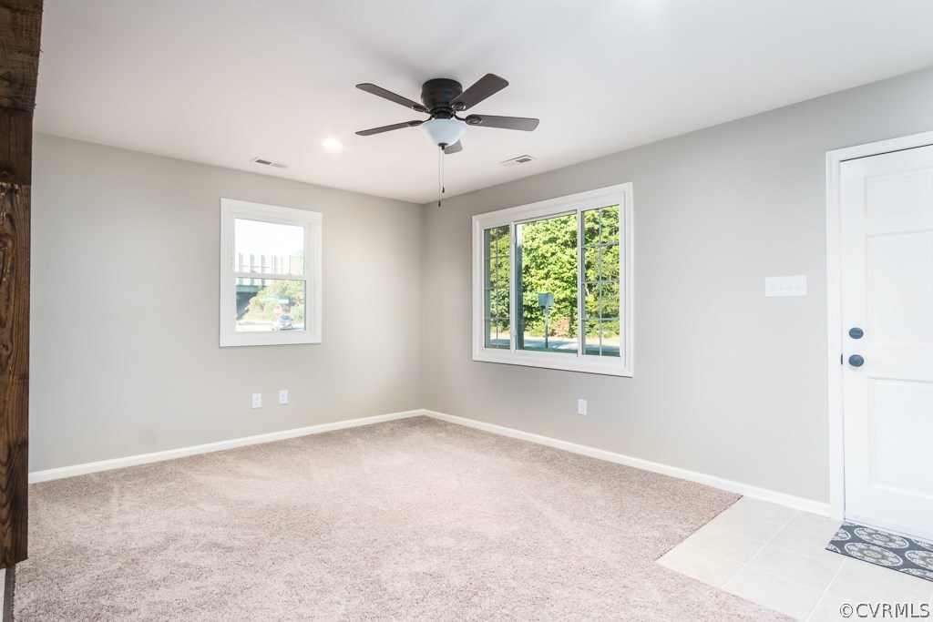 1105 Enon Church Road Chester, VA 23836 - Photo 17 of 34 a view of a livingroom with a ceiling fan and window