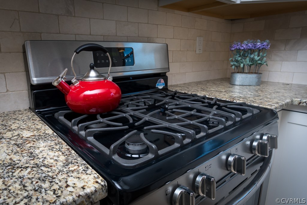 1105 Enon Church Road Chester, VA 23836 - Photo 31 of 34 a stove top oven sitting inside of a kitchen