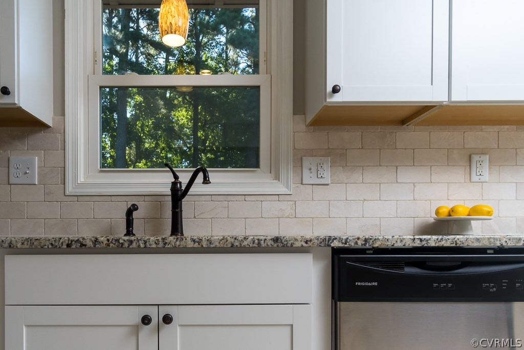 1105 Enon Church Road Chester, VA 23836 - Photo 33 of 34 a kitchen with granite countertop a stove a sink and a window