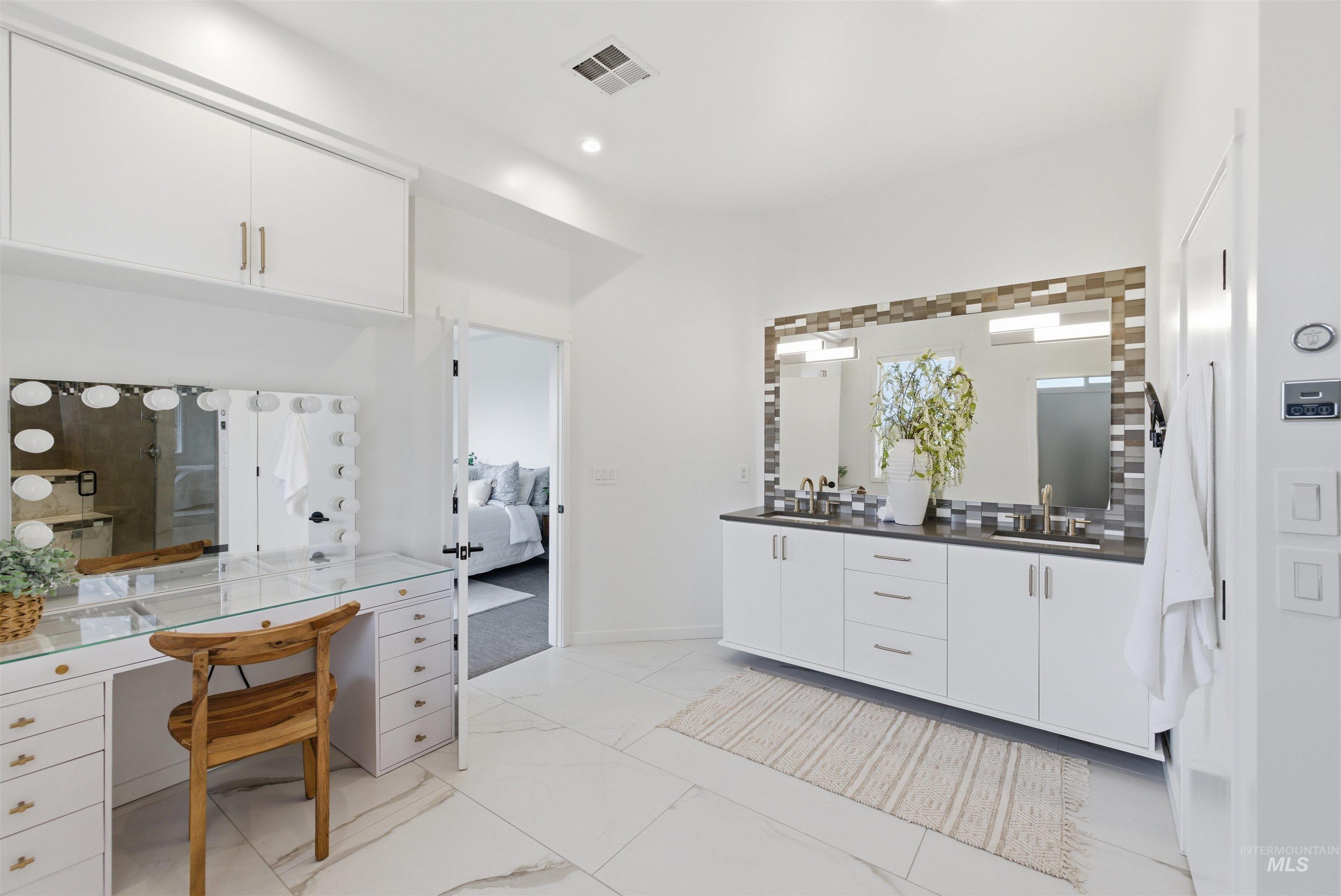 4275 36th Street Boise, ID 83703 - Photo 22 of 50 Ensuite bathroom with double vanity and recessed lighting