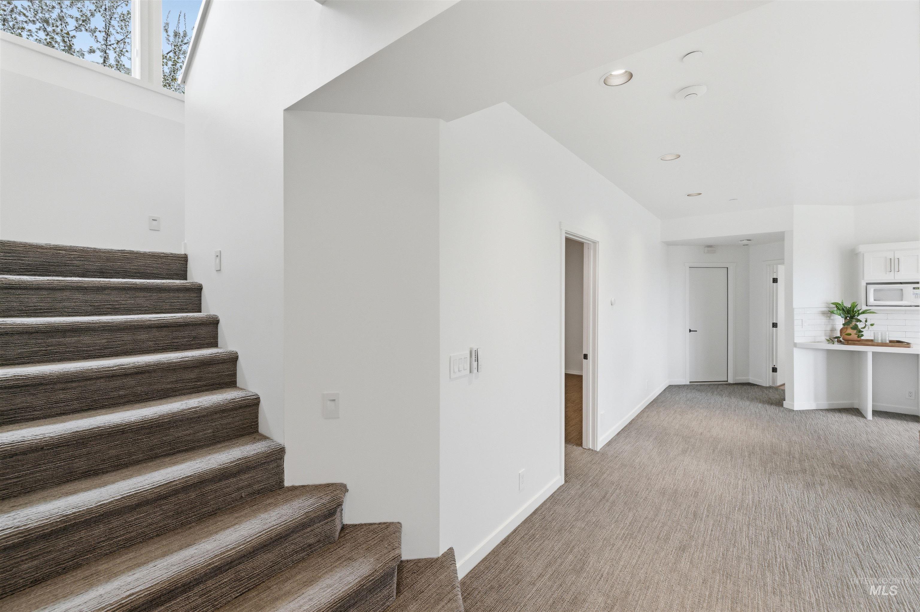 4275 36th Street Boise, ID 83703 - Photo 24 of 50 Staircase featuring carpet floors and recessed lighting