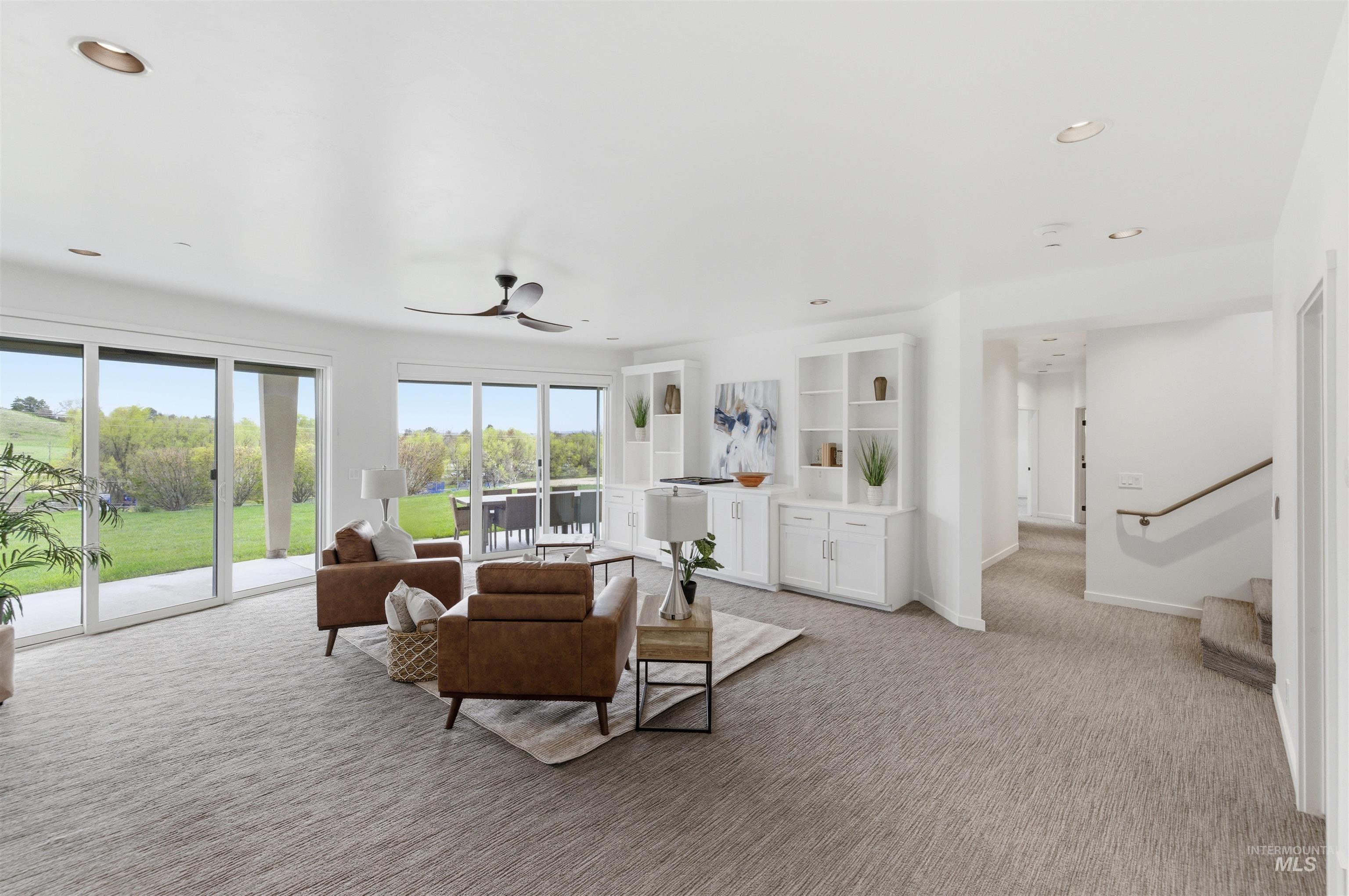 4275 36th Street Boise, ID 83703 - Photo 27 of 50 Living area featuring light colored carpet, ceiling fan, and recessed lighting