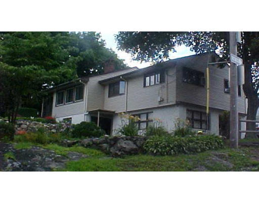 22 Burdett Road Lynn, MA 01904 - Photo 2 of 2 a black and white photo of a house