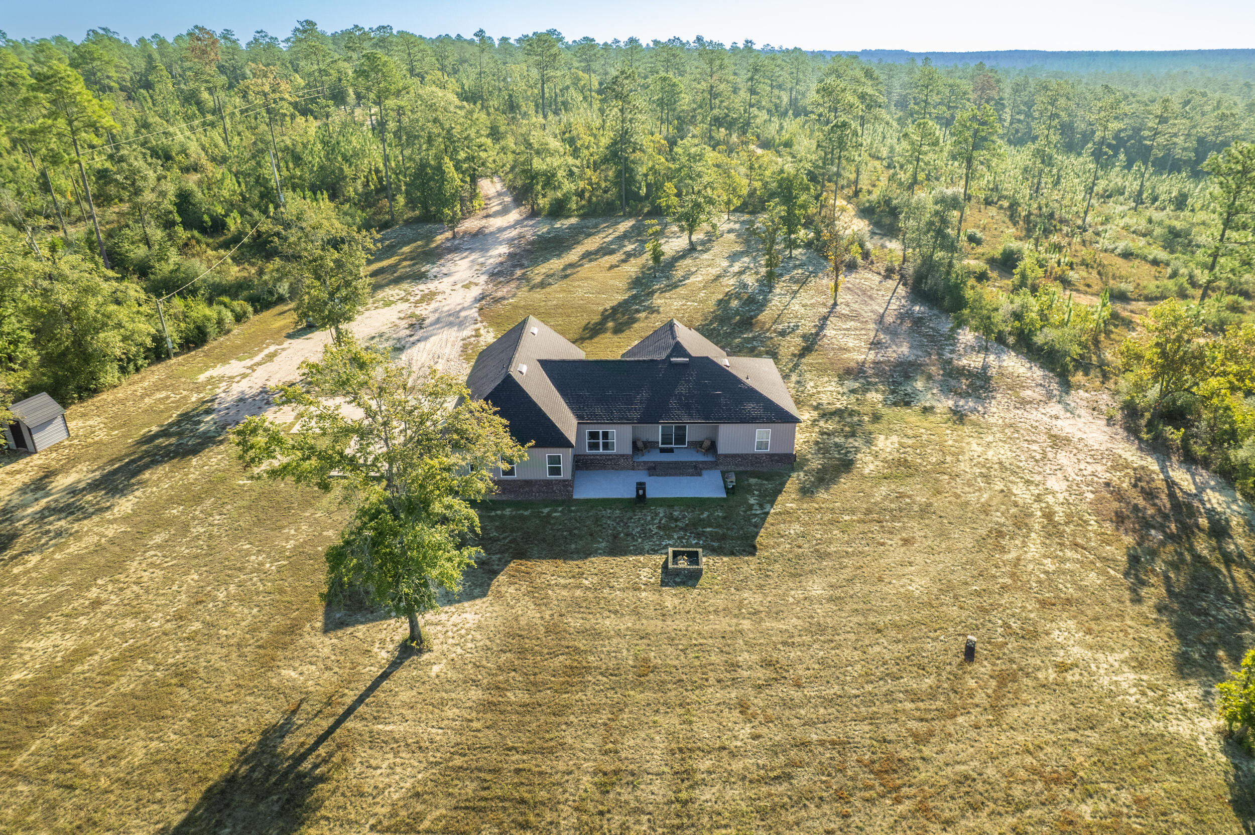 6150 Sherman Kennedy Road Baker, FL 32531 - Photo 22 of 43 a picture of a yard
