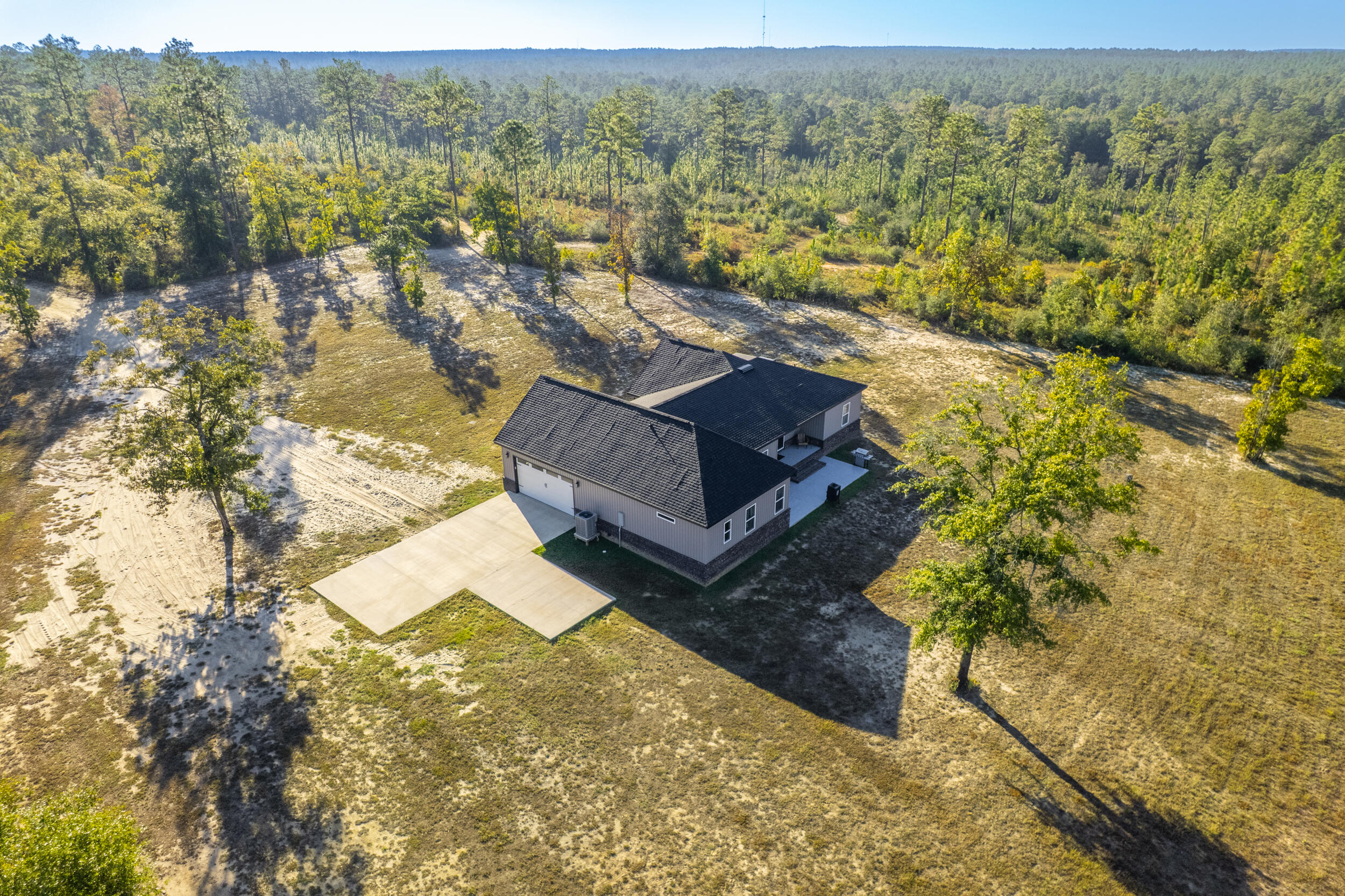 6150 Sherman Kennedy Road Baker, FL 32531 - Photo 23 of 43 a view of a lake with a mountain