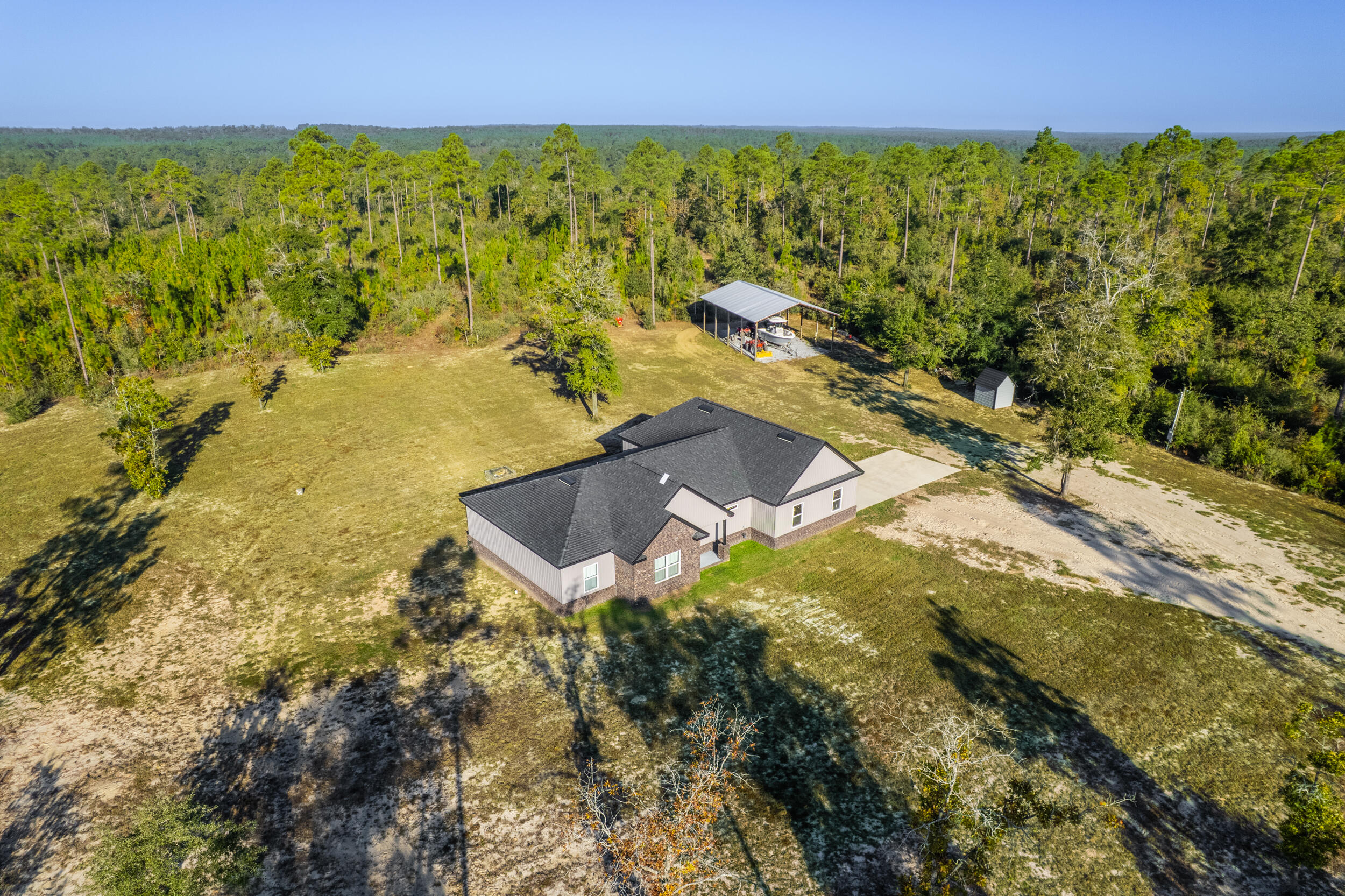 6150 Sherman Kennedy Road Baker, FL 32531 - Photo 26 of 43 a view of a lake