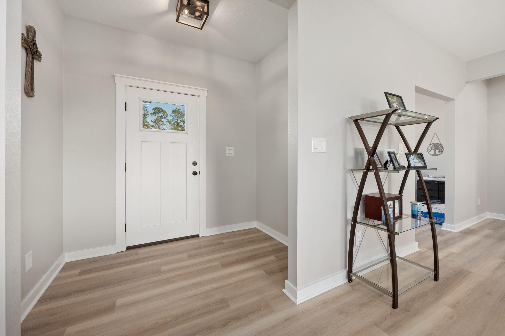 6150 Sherman Kennedy Road Baker, FL 32531 - Photo 4 of 43 a view of an entryway with wooden floor