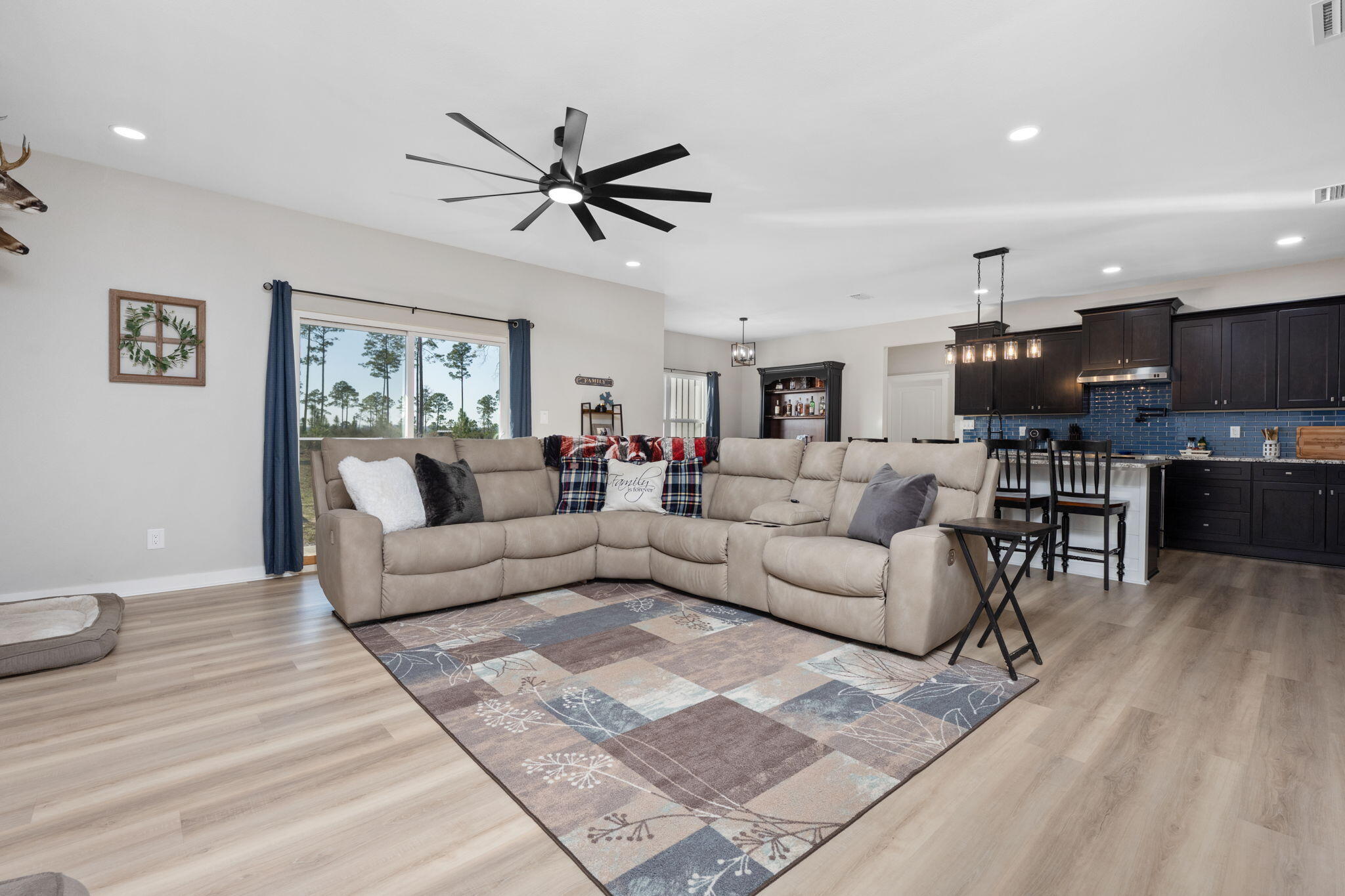 6150 Sherman Kennedy Road Baker, FL 32531 - Photo 5 of 43 a living room with furniture a view of bedroom and a window