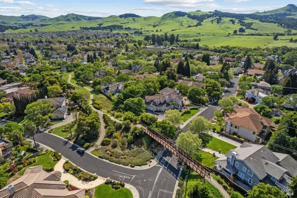an aerial view of residential building with parking space