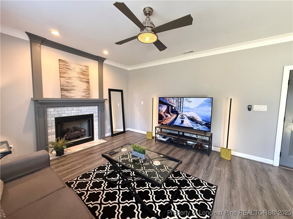 171 Apache Trail Sanford, NC 27332 - Photo 13 of 37 a living room with furniture and a fireplace