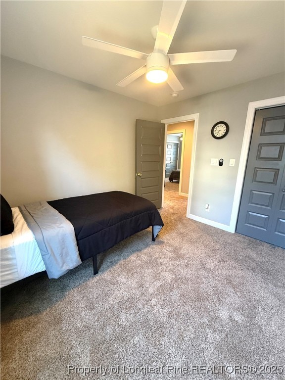171 Apache Trail Sanford, NC 27332 - Photo 23 of 37 a spacious bedroom with a bed and a cabinets