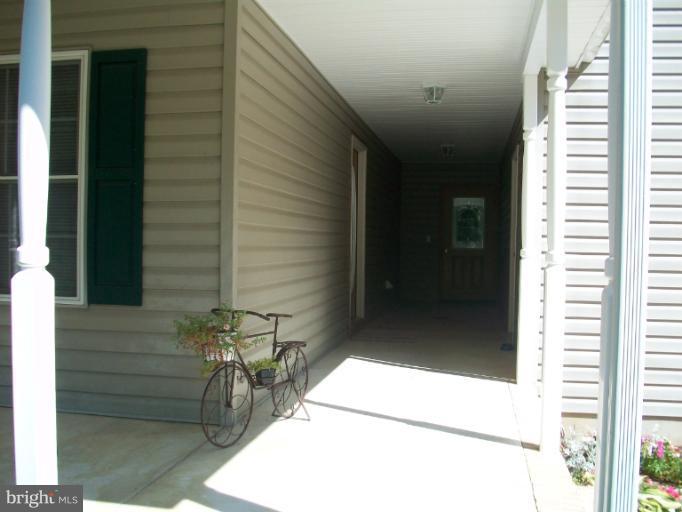 31430 Chesterville Bridge Road Millington, MD 21651 - Photo 14 of 14 breezeway between house and garage