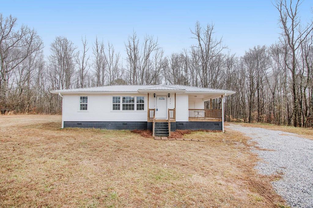 471 Mountain View Road Buchanan, GA 30113 - Photo 1 of 1 a view of a house with a yard covered in snow