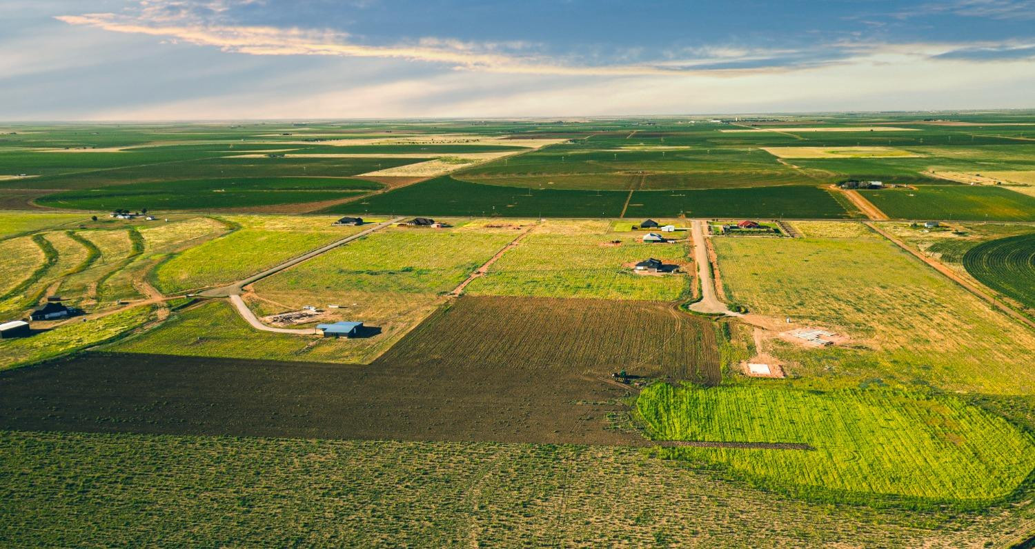 4190 Mark Street Ropesville, TX 79358 - Photo 1 of 7 a view of an outdoor space and tennis court